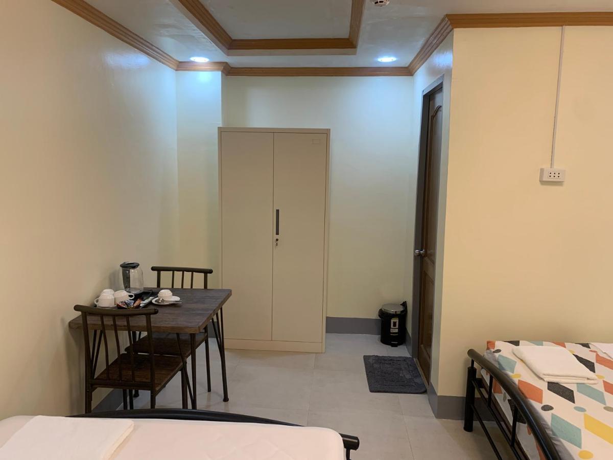 Zl Travelers Inn Batuan Extérieur photo