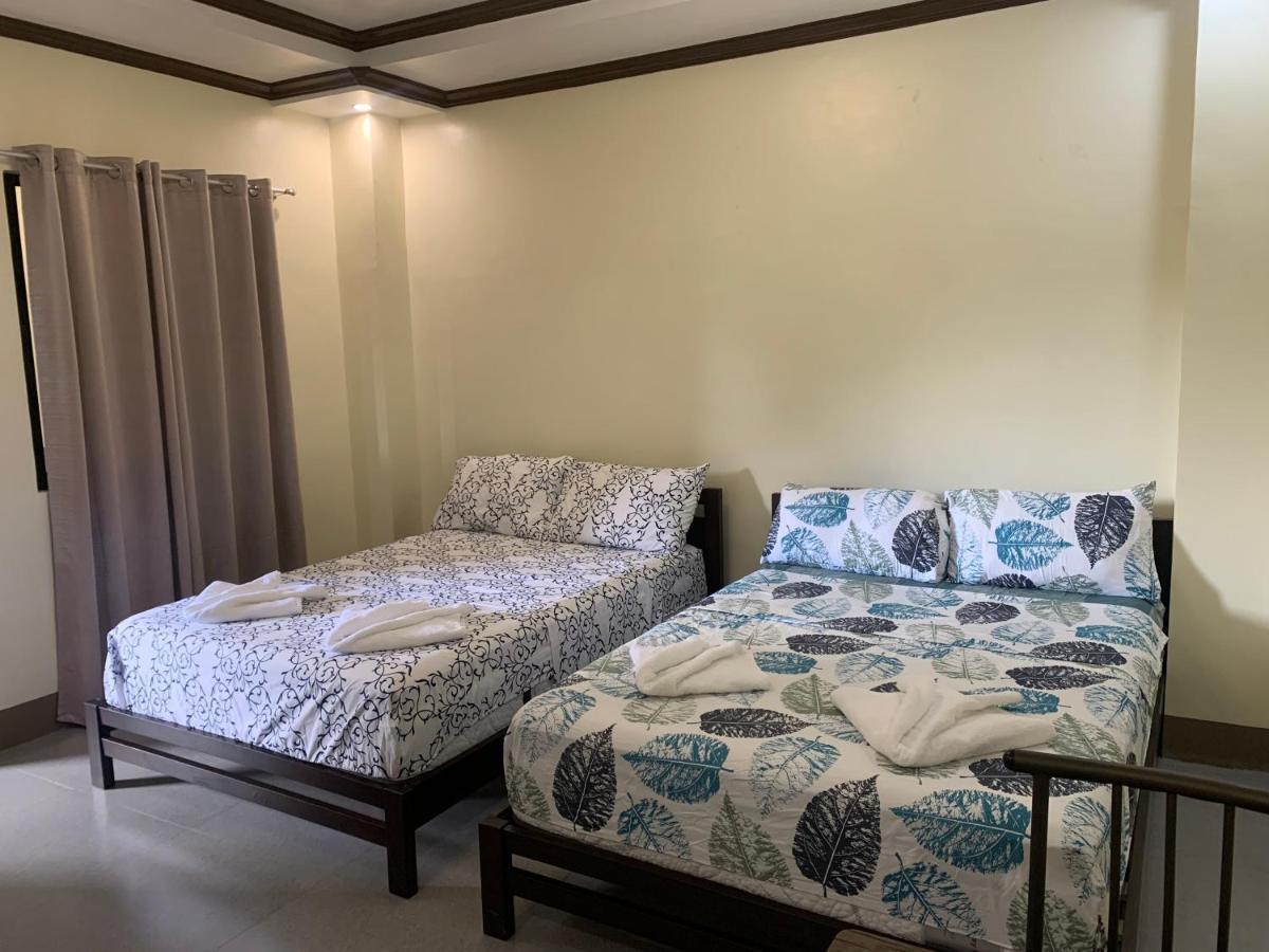 Zl Travelers Inn Batuan Extérieur photo