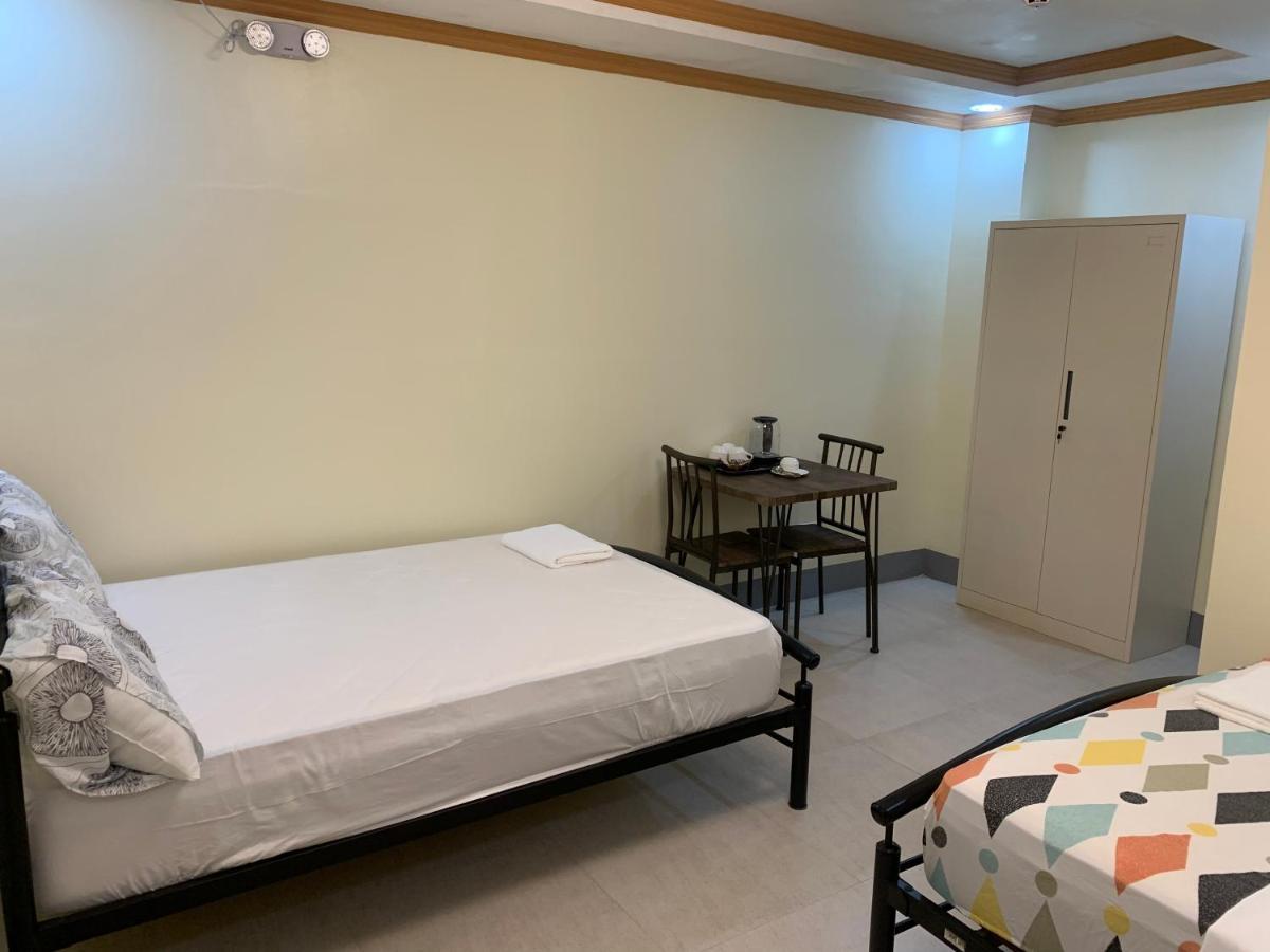 Zl Travelers Inn Batuan Extérieur photo