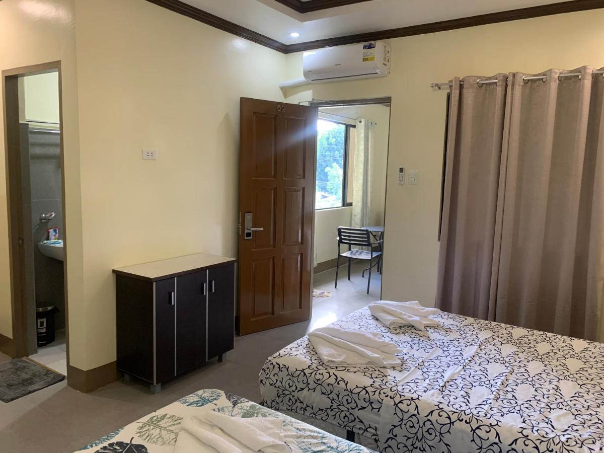 Zl Travelers Inn Batuan Extérieur photo
