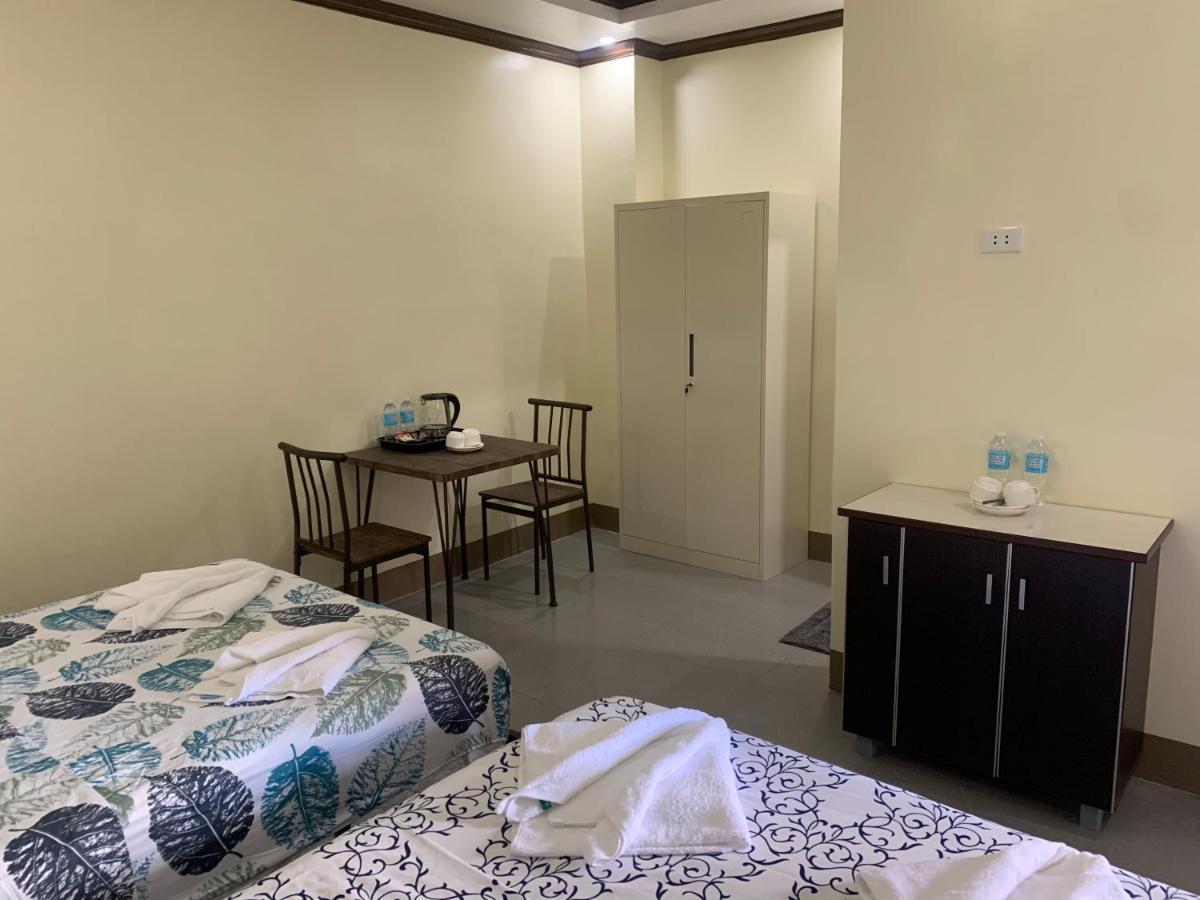 Zl Travelers Inn Batuan Extérieur photo