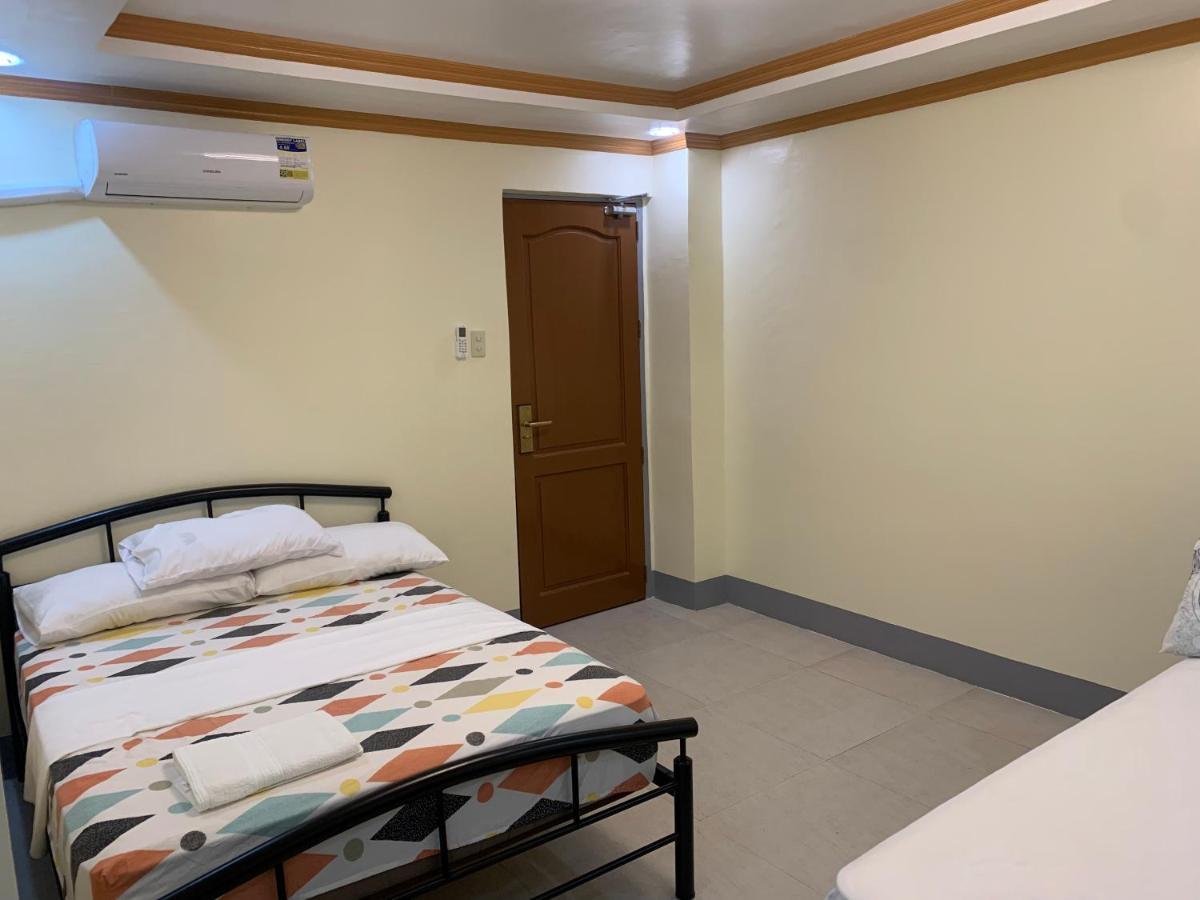 Zl Travelers Inn Batuan Extérieur photo