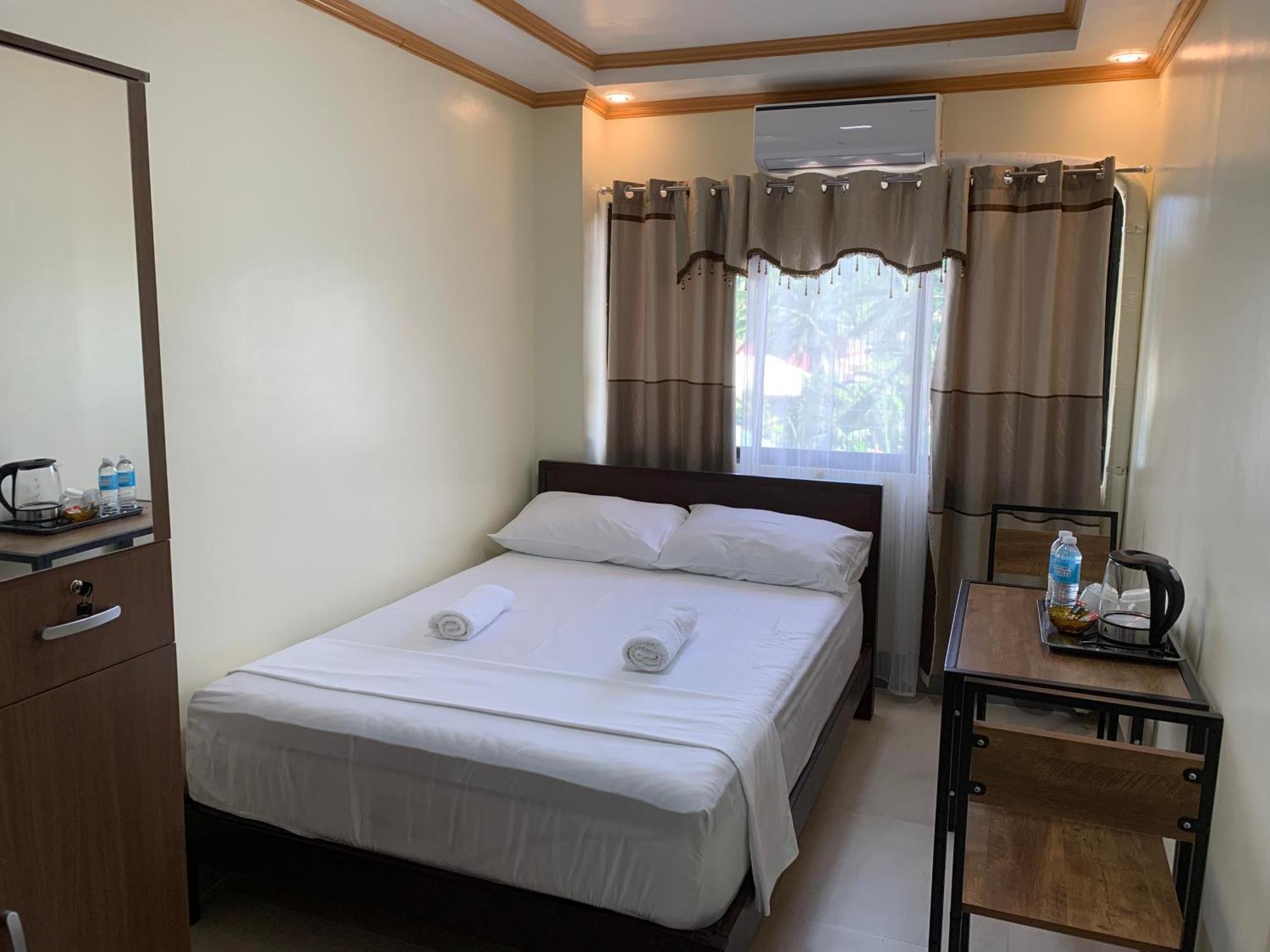 Zl Travelers Inn Batuan Extérieur photo