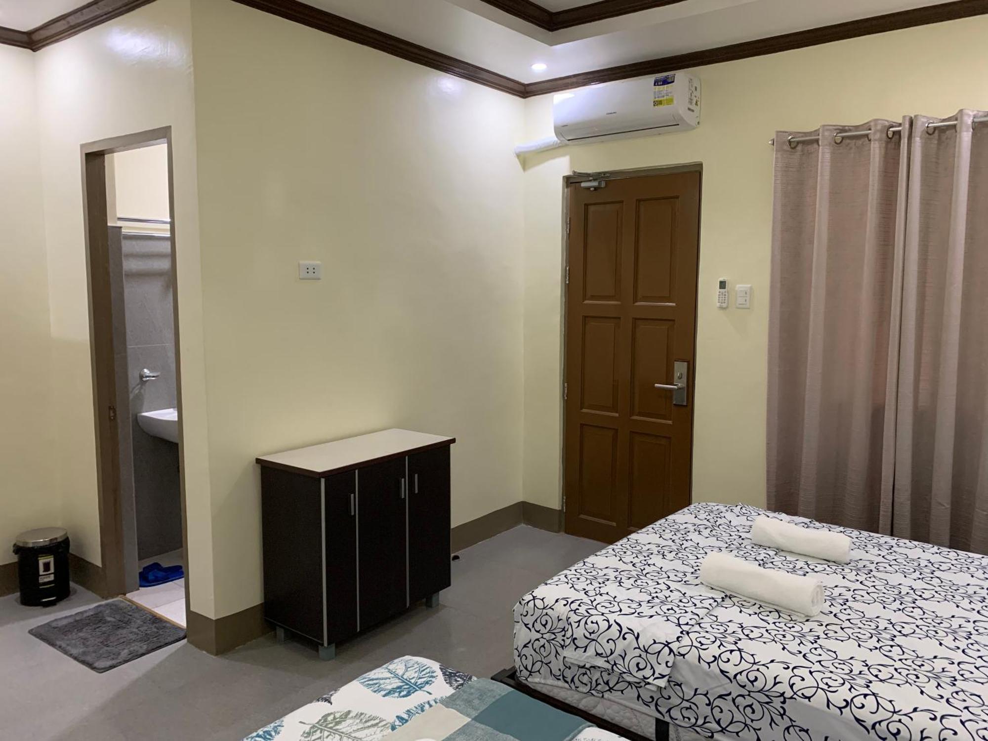 Zl Travelers Inn Batuan Extérieur photo
