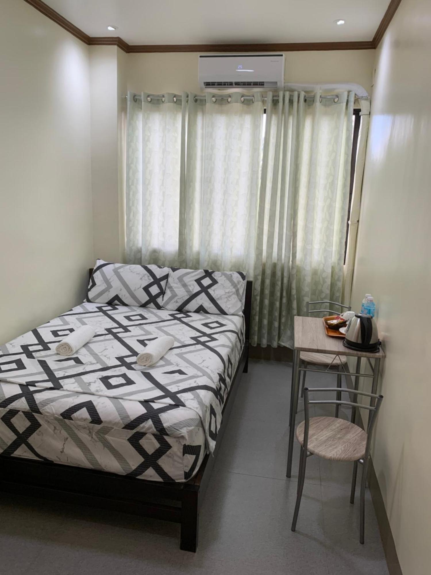 Zl Travelers Inn Batuan Extérieur photo