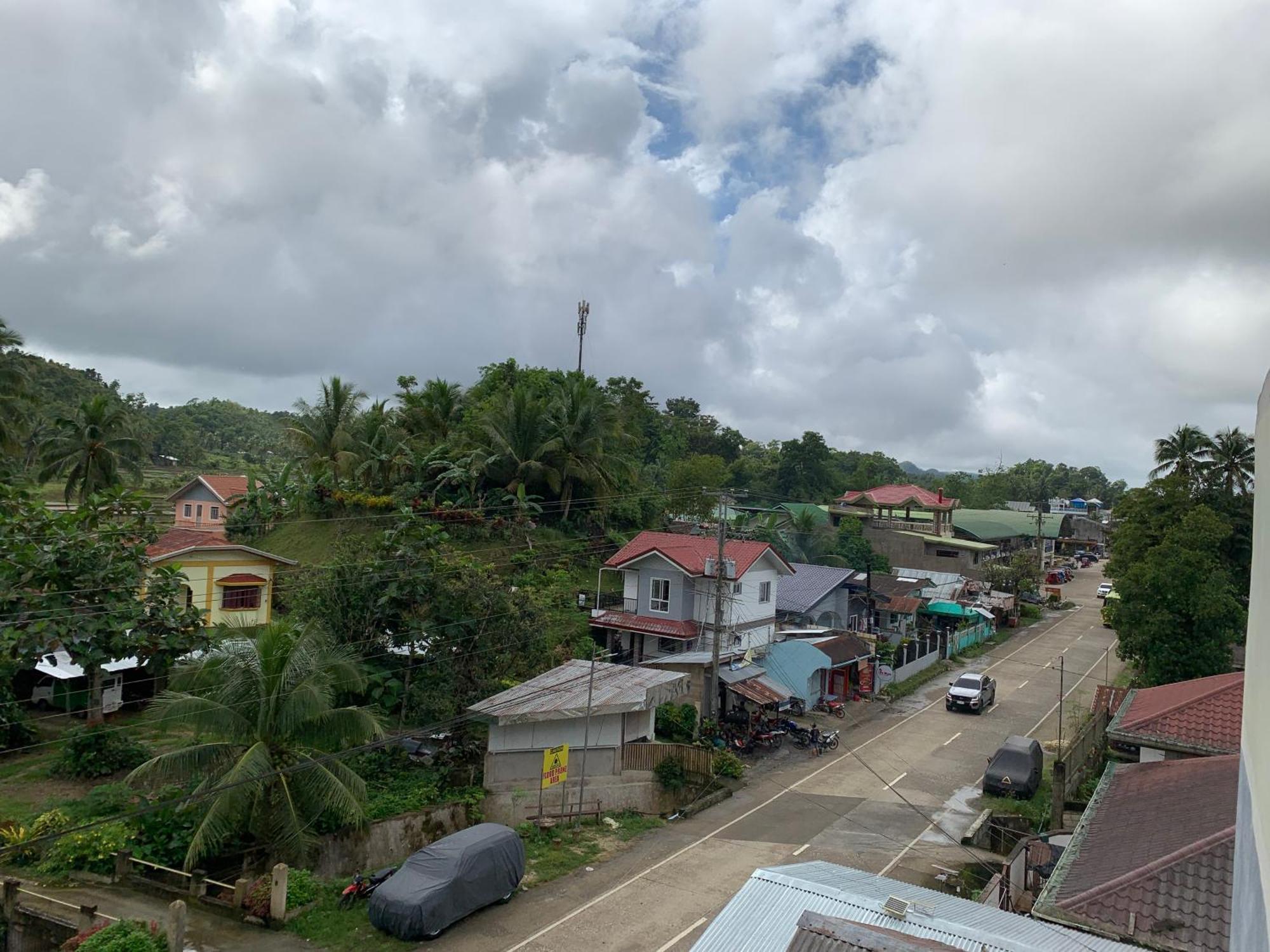 Zl Travelers Inn Batuan Extérieur photo