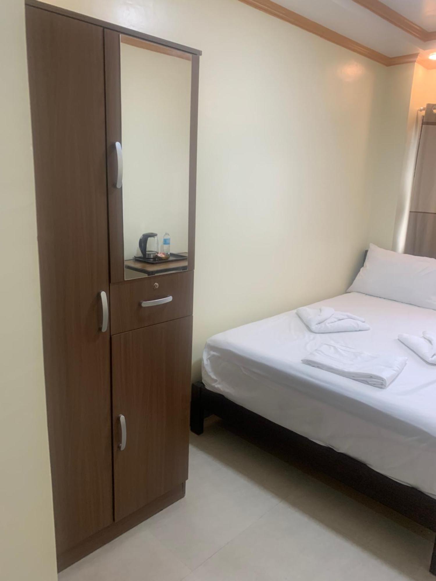 Zl Travelers Inn Batuan Extérieur photo