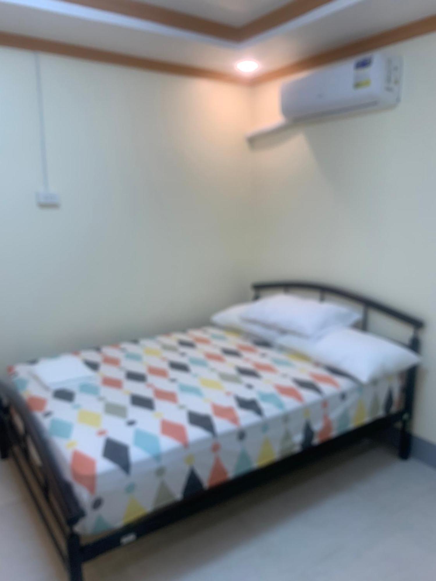Zl Travelers Inn Batuan Extérieur photo