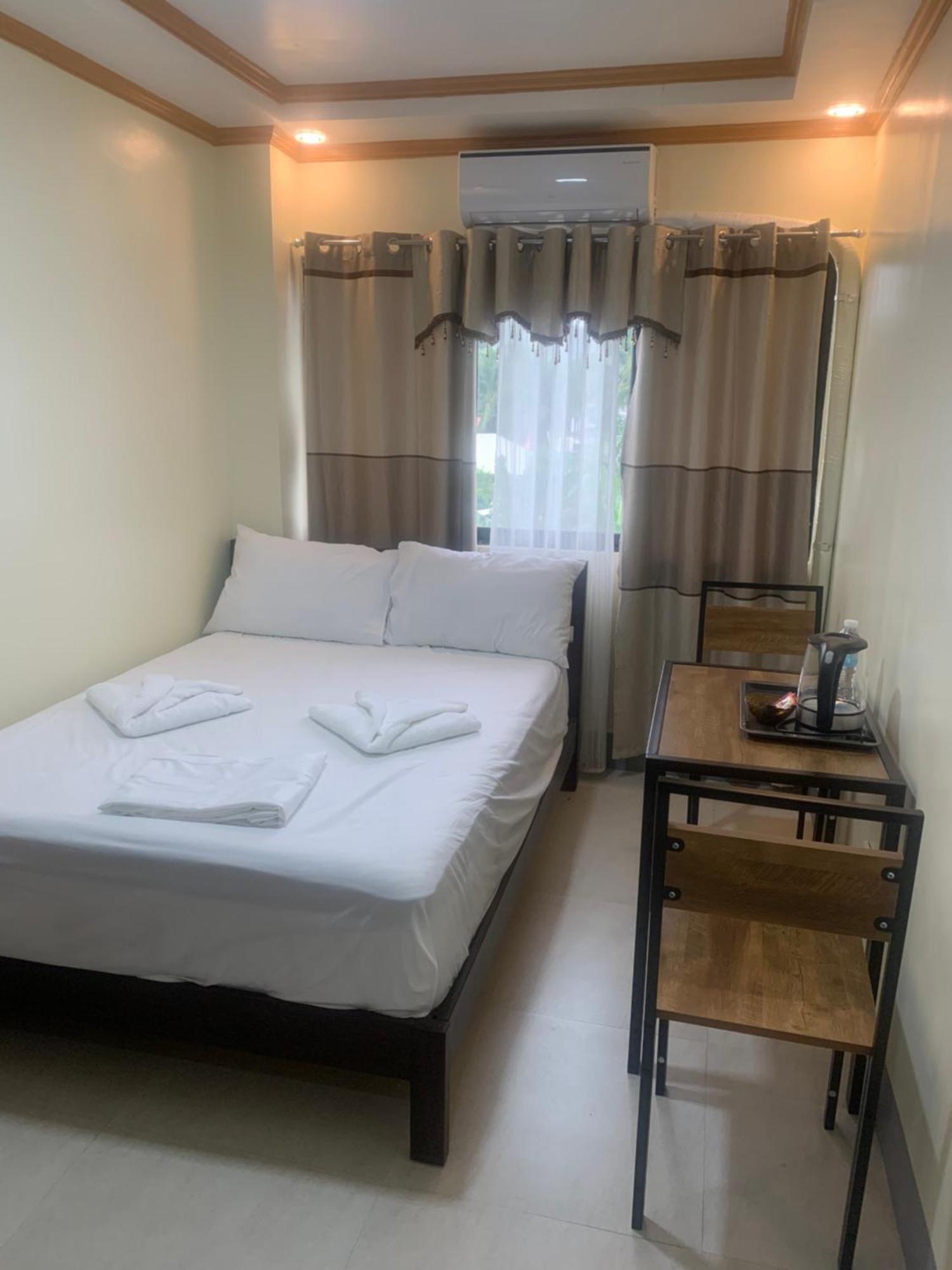 Zl Travelers Inn Batuan Extérieur photo