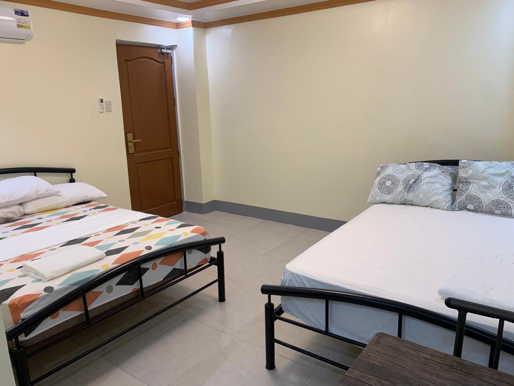 Zl Travelers Inn Batuan Extérieur photo